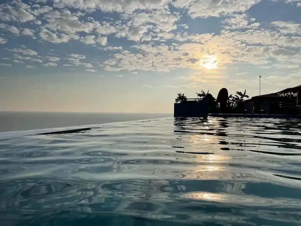 Rooftop infinity pool at golden hour
