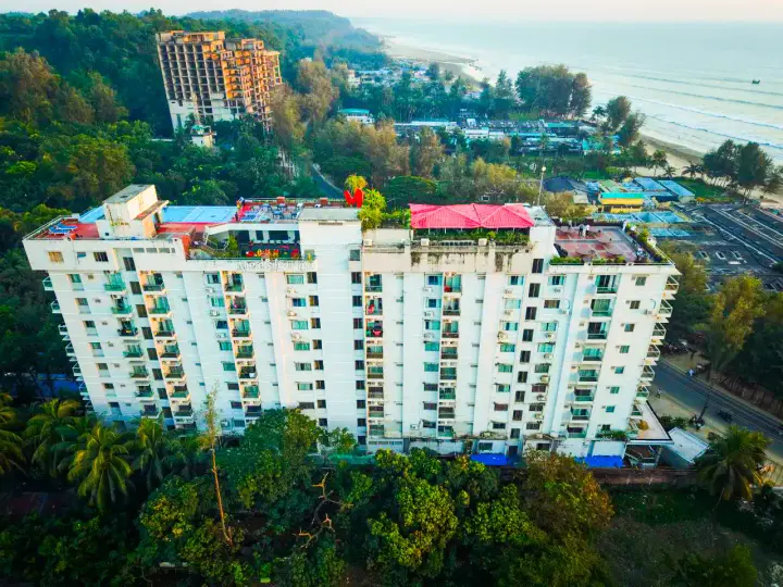 Hotel building with the sea in the distance